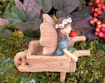 Miniature Fairy Eliza in a Wooden Wheelbarrow