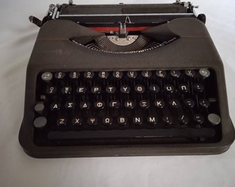 Vintage Hermes Baby manual portable typewriter small machine in the world. brands and colors available.