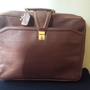 Vintage schoolbag, brown schoolbag, large model with its key, and two mouths and flat opening