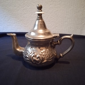 Sealed and carved teapot, oriental decor,