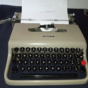 Vintage typewriter, Olivetti studio 22, Italian made, 50s, colors and brands available, free gift wrapping,