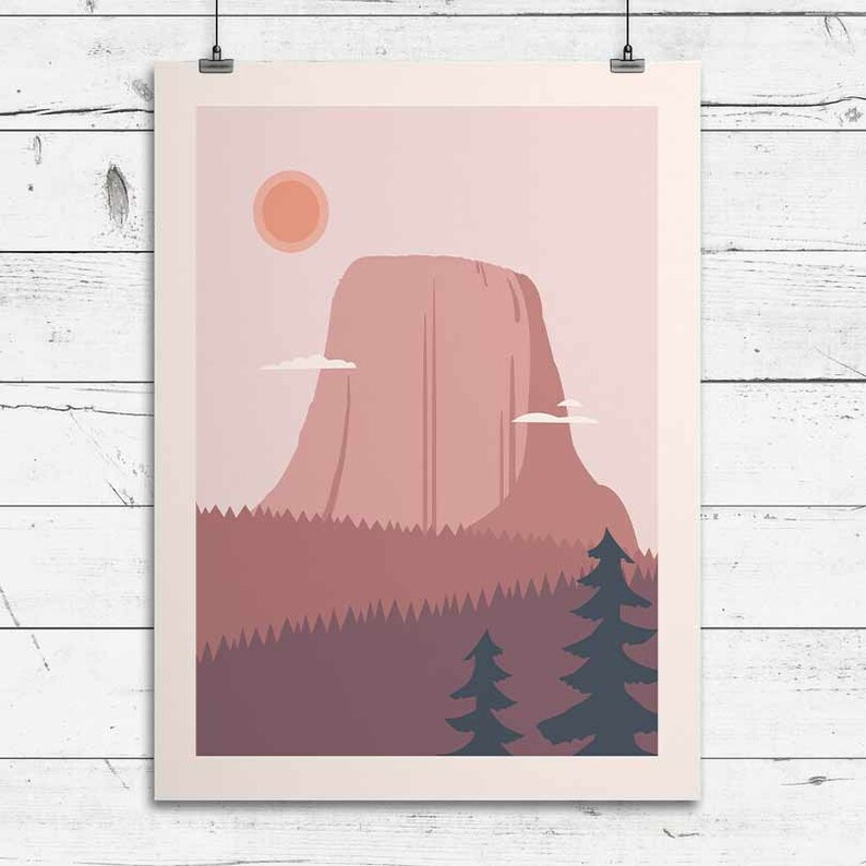 May include: A digital illustration of a pink mountain with a pink sun in the sky and a forest of trees at the base of the mountain.