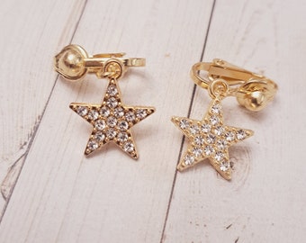 Boucle D'oreille Clip Dorée En Forme D'étoile - Ornée De 6 Strass, Métal Martelé, Occasion En Bon état, Sans Marque