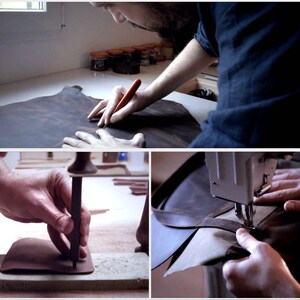 May include: Close-up of a leather craftsman working on a brown leather bag. The craftsman is using a tool to punch holes in the leather and a sewing machine to stitch the seams.