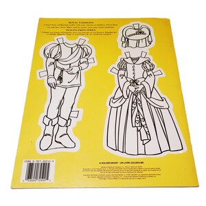 May include: A vintage children's paper doll book titled "Royal Fashions." The cover is yellow and features two outlined paper dolls, a prince and a princess, with cut-out clothing. The book includes text in English and French.