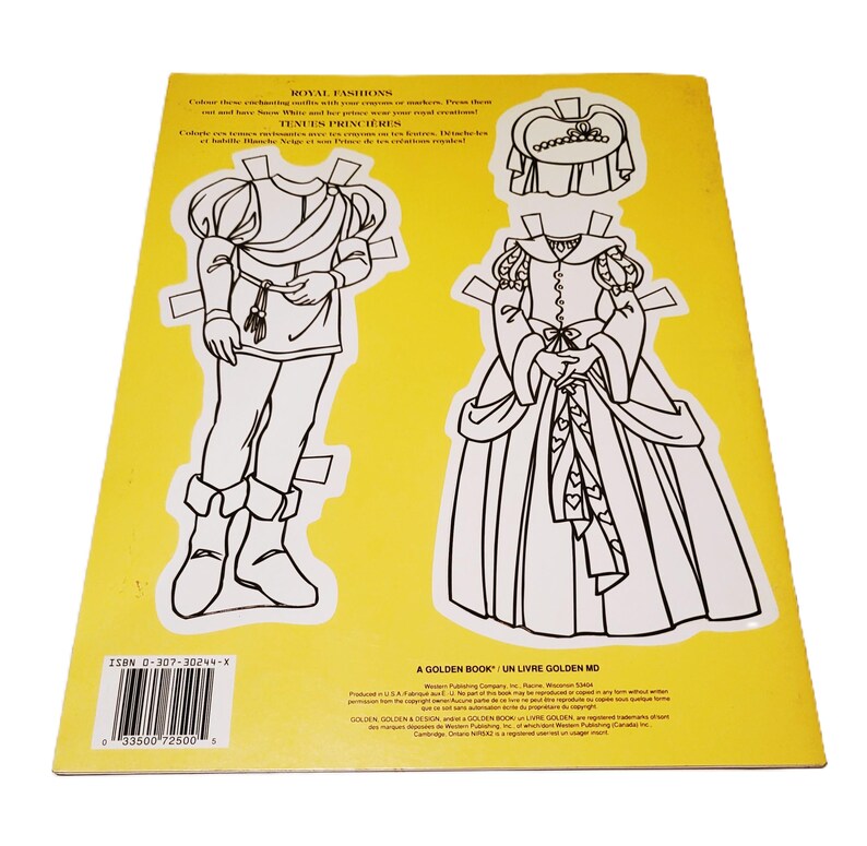 May include: A vintage children's paper doll book titled "Royal Fashions." The cover is yellow and features two outlined paper dolls, a prince and a princess, with cut-out clothing. The book includes text in English and French.