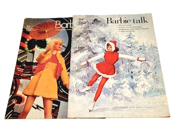 May include: Two vintage Barbie magazines. The magazine on the left features a Barbie doll wearing a yellow dress and a red jacket. The magazine on the right features a Barbie doll wearing a red dress and white fur trim, ice skating in a snowy landscape. The magazine on the right has the title "Barbie talk" and lists "Gifts of Goodness", "A Merry Holiday Decoration", "Barbie and Francie Fashion Models", "Puzzles and Games".