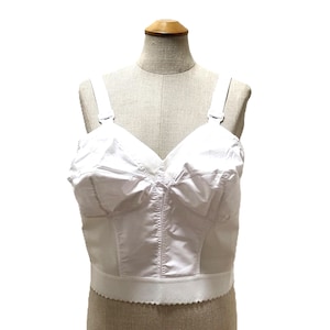 May include: White cotton bra with adjustable straps and a scalloped hem.