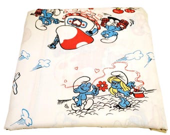 Drap plat Schtroumpfs des années 80, village des Schtroumpfs et thème musical