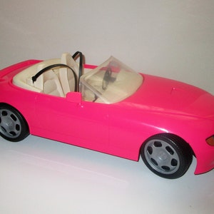 PINK CONVERTIBLE BARBIE CAR VERY GOOD CONDITION WITH ALL STICKERS!