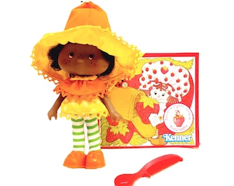 1981 Orange Blossom Strawberry Shortcake Doll with Comb and Book