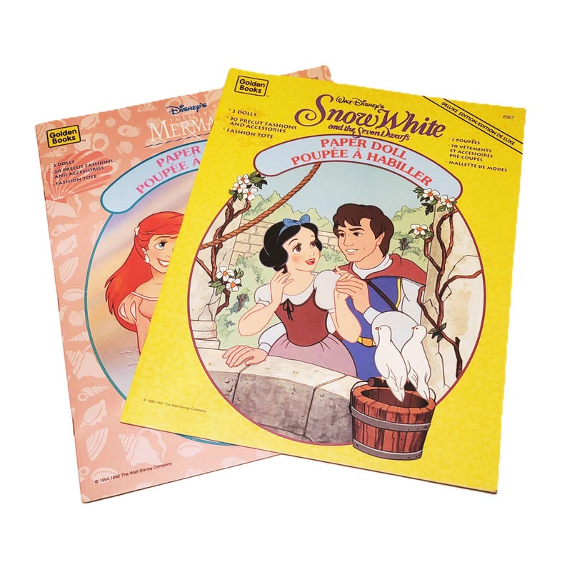 May include: Two vintage Disney Golden Books paper dolls. One features Ariel from The Little Mermaid, the other Snow White and the Seven Dwarfs. Both books have illustrations of the characters and include precut fashions and accessories.