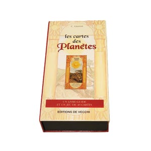 May include: A rectangular box set titled Les Cartes des Planètes by C. Grande, featuring a cream-colored cover with two beige pillars, a central illustration of a lion under a sun, and the text Editions de Vecchi and Un livre-guide et un jeu de 40 cartes.