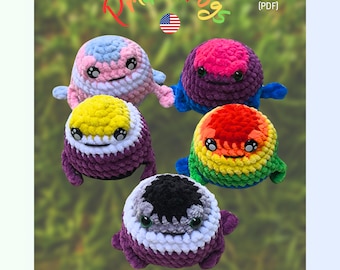 May include: A collection of five colorful crochet frog plushies. Each frog features a unique color scheme, including rainbow, pink and blue, yellow and purple, and black and white. The image includes the text "Pride Frogs" and "Full Crochet Pattern (PDF)". The text "Chonky. Grumpy. Full of love (and yarn)." is also included.