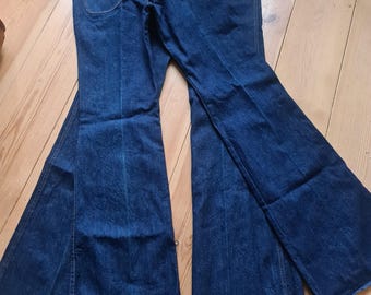 Calça jeans boca de sino vintage Mccloud, nunca usada, estilo anos 70, nova de estoque antigo.