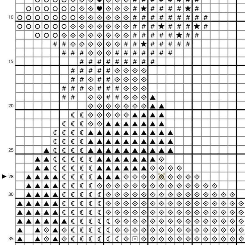 May include: A cross-stitch pattern chart with a grid of squares. The design features various symbols, including circles, diamonds, triangles, and stars, in black, white, and other colors. The chart is for a craft project.