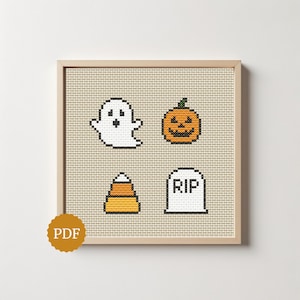 May include: A cross stitch pattern featuring four Halloween icons: a white ghost, an orange jack-o'-lantern, a yellow and orange candy corn, and a white tombstone with the letters RIP, all displayed in a light wooden frame with a PDF icon.