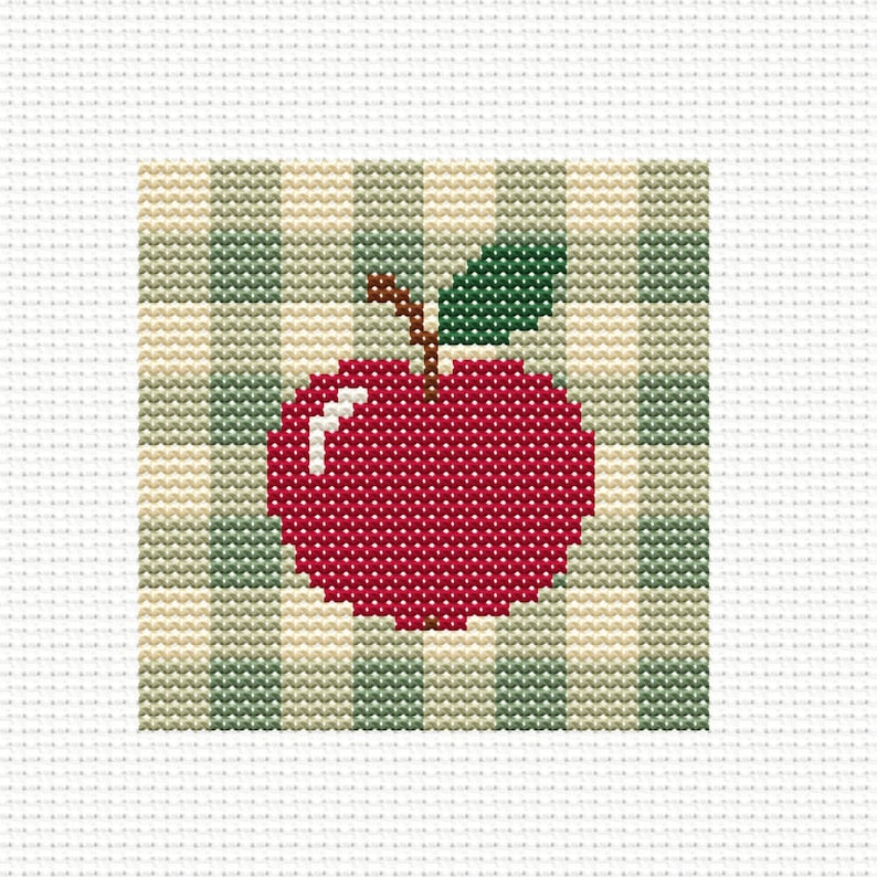 May include: A cross-stitch pattern featuring a bright red apple with a brown stem and a single dark green leaf. The apple is centered against a background of vertical stripes in alternating shades of light beige and muted sage green.