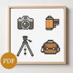 May include: A white ceramic mug with a black handle and the text "But First, Coffee" in a black, handwritten-style font. The mug is on a white surface.