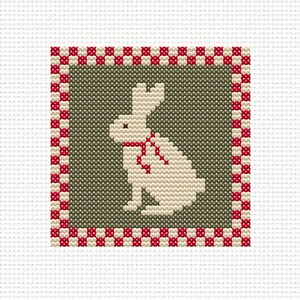 May include: A cross-stitch design featuring a cream-colored rabbit with a red bow tie, set against a muted green background. The design is framed by a red and white checkered border, creating a classic and charming aesthetic. The background is white.