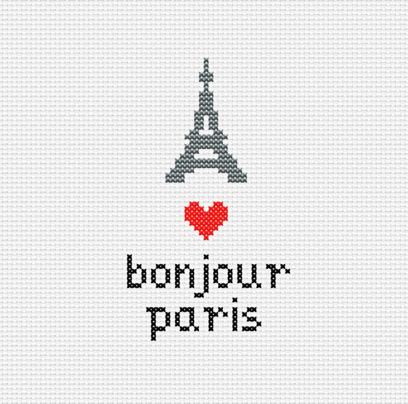Może przedstawiać: Wz&oacute;r haftu krzyżykowego z szarą Wieżą Eiffla, czerwonym sercem i czarnymi słowami "bonjour paris". Projekt znajduje się na białym tle, oferując prostą, uroczą estetykę.