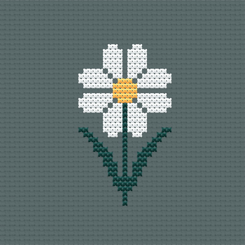 May include: A white daisy with a yellow center, embroidered on a dark gray background. The daisy has a green stem and leaves.