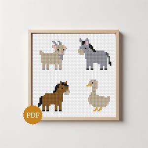 May include: A cross-stitch pattern featuring four pixelated animals: a tan goat, a grey donkey, a brown horse, and a light tan goose. The design is displayed within a light wood frame, and a circular gold badge with the text PDF is in the corner.