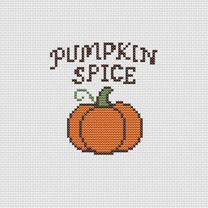 May include: Cross-stitch design featuring the words "PUMPKIN SPICE" in dark brown above an orange pumpkin with a green stem and vine. The design is on a white background, perfect for fall decor.