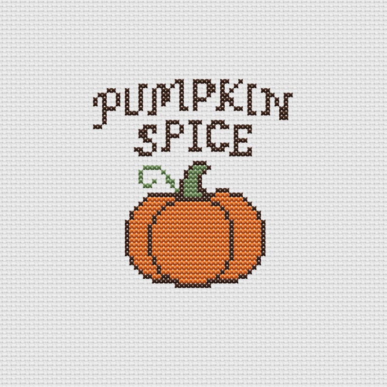 May include: Cross-stitch design featuring the words "PUMPKIN SPICE" in dark brown above an orange pumpkin with a green stem and vine. The design is on a white background, perfect for fall decor.