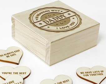 May include: A wooden box with a heart-shaped lid that says "10 Reasons Why I Love You Daddy" on the top. The box contains 10 small wooden hearts with different messages on them.