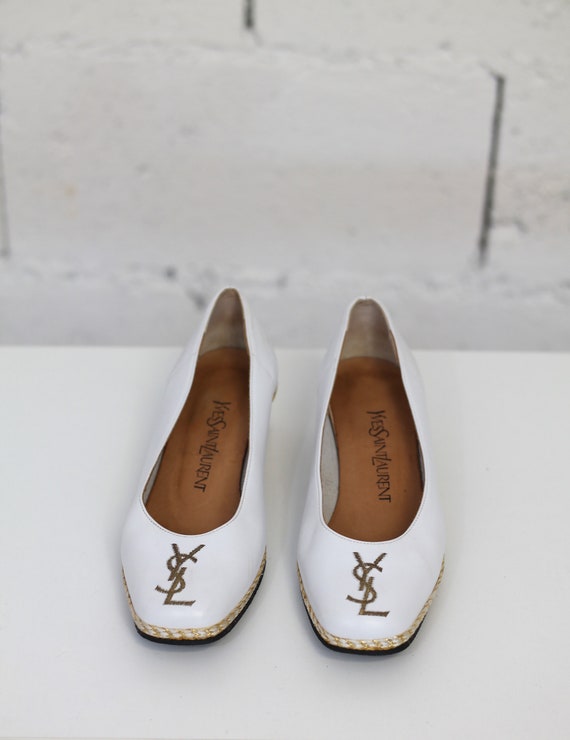 Pair of Yves Saint Laurent leather shoes