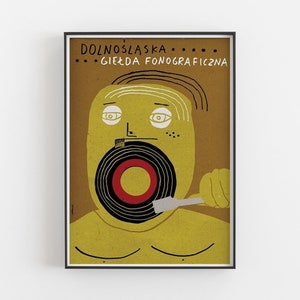 May include: A yellow illustration of a person with a record on their mouth and a brush in their hand. The text "DOLNOŚLĄSKA... GIEŁDA FONOGRAFICZNA" is at the top of the image.