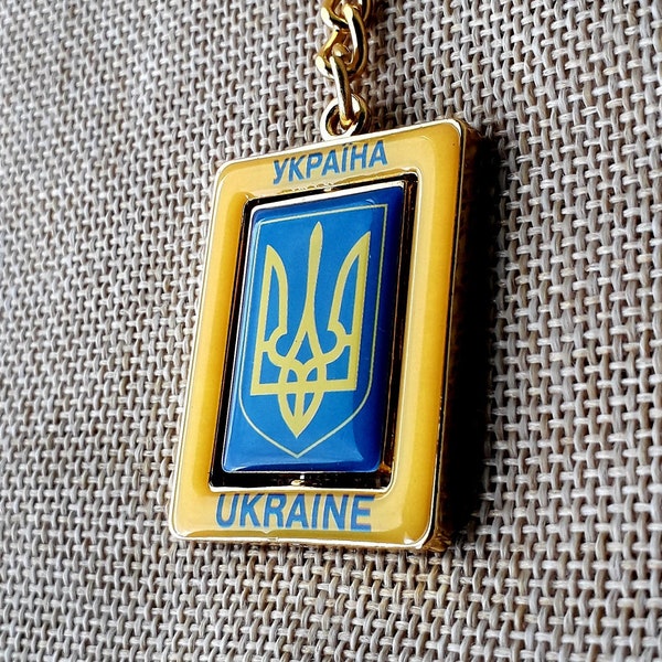 1pc. Ukrainian keychain with the national emblem and a blue-yellow Flag of Ukraine. Ukrainian coat of arms Trident Tryzub Souvenir Gold