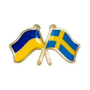 May include: Two crossed flags, one yellow and blue, the other blue and yellow with a yellow cross. The flags are on a gold background.