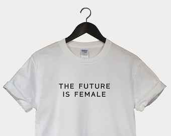 May include: White t-shirt with black text that reads "THE FUTURE IS FEMALE".
