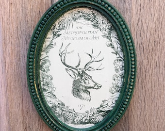 Vintage Christmas Deer Wall Art | Framed Metropolitan Museum of Art Stag | Academic & Whimsical Holiday Decor | Distressed Green Oval Frame