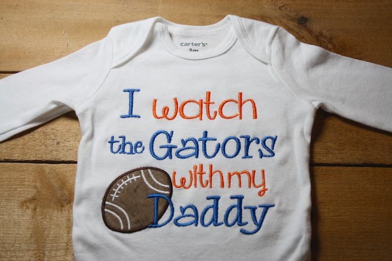 New Orleans Saints Watching With Grandpa Baby Short Sleeve Bodysuit