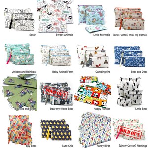 May include: A collection of 15 different reusable zippered pouches with various colorful and whimsical designs. The pouches are made of linen and cotton and feature themes such as animals, mermaids, bicycles, and pandas. Some pouches are sold out.