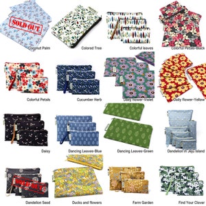 May include: A collection of 15 different fabric zippered pouches with various floral and leaf patterns. The pouches are available in a variety of sizes and colors, including blue, green, yellow, red, and black. The pouches are perfect for storing small items like makeup, jewelry, or electronics.
