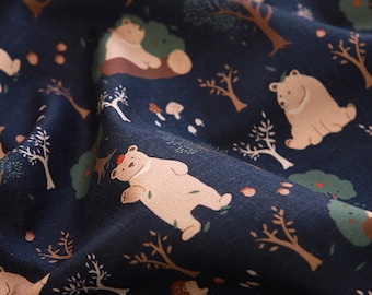 May include: A navy blue fabric with a repeating pattern of brown bears, trees, and mushrooms. The bears are in various poses, some standing, some sitting, and some walking. The trees are green and brown, and the mushrooms are red and white.