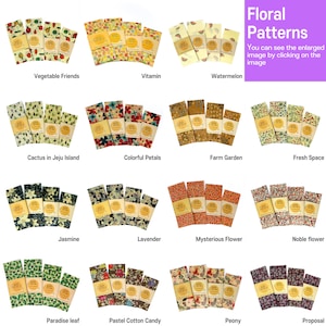 May include: A set of 12 different patterned food wraps, each with a unique design. The wraps are made of beeswax, organic cotton, and tree resin. The designs include floral patterns, fruits, vegetables, and abstract patterns. The wraps are reusable and washable.