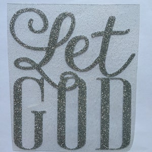 Op de afbeelding: Zilveren glitter vinyl sticker met de woorden "Let God" in een cursief schrift.