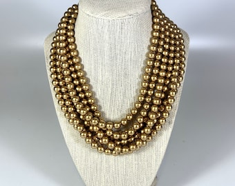 Carol Lee multi strand gold bead necklace