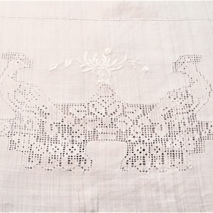 Hemstitched embroidered linen tablecloth