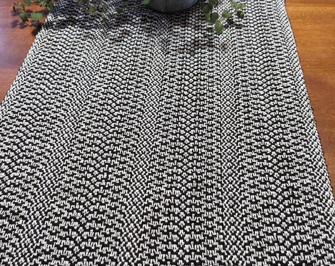 Classic Elegance: Handwoven Black and White Table Runner