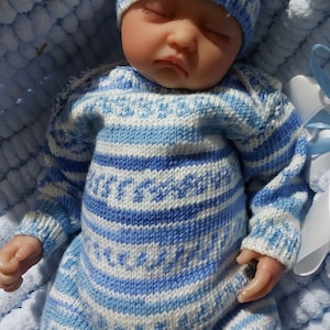 Baby clothing set includes all in one, bootees and hat.  Baby gift set, suitable for boy or girl