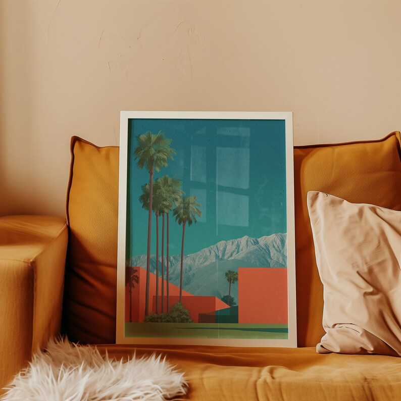 May include: A framed art print featuring a desert landscape with palm trees, red buildings, and mountains under a teal sky. The artwork is displayed on a mustard-colored couch with pillows and a faux fur throw.