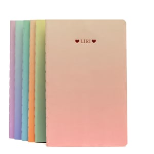 May include: Set of six pastel coloured notebooks with a gradient effect. The front cover of the notebook on the right has the text "♥ LIRI ♥" in red.