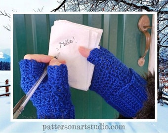 May include: A pair of blue crocheted fingerless gloves with a white note that says "Hello!" written on it.