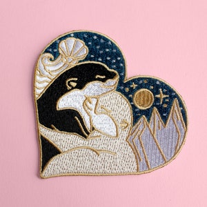 Romantic Hugging Otters iron on embroidered patch
